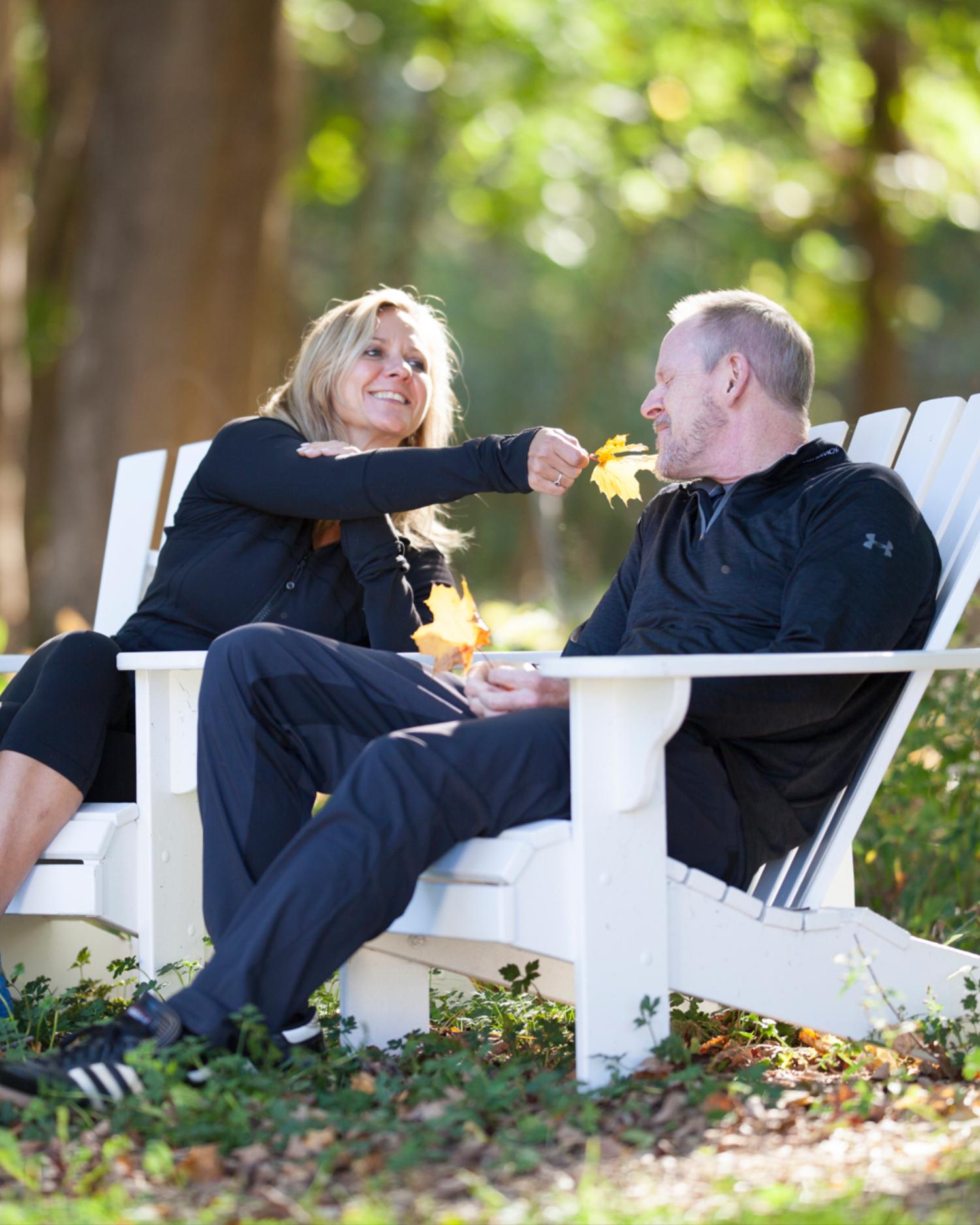 Two people in Lenox sitting holding each other