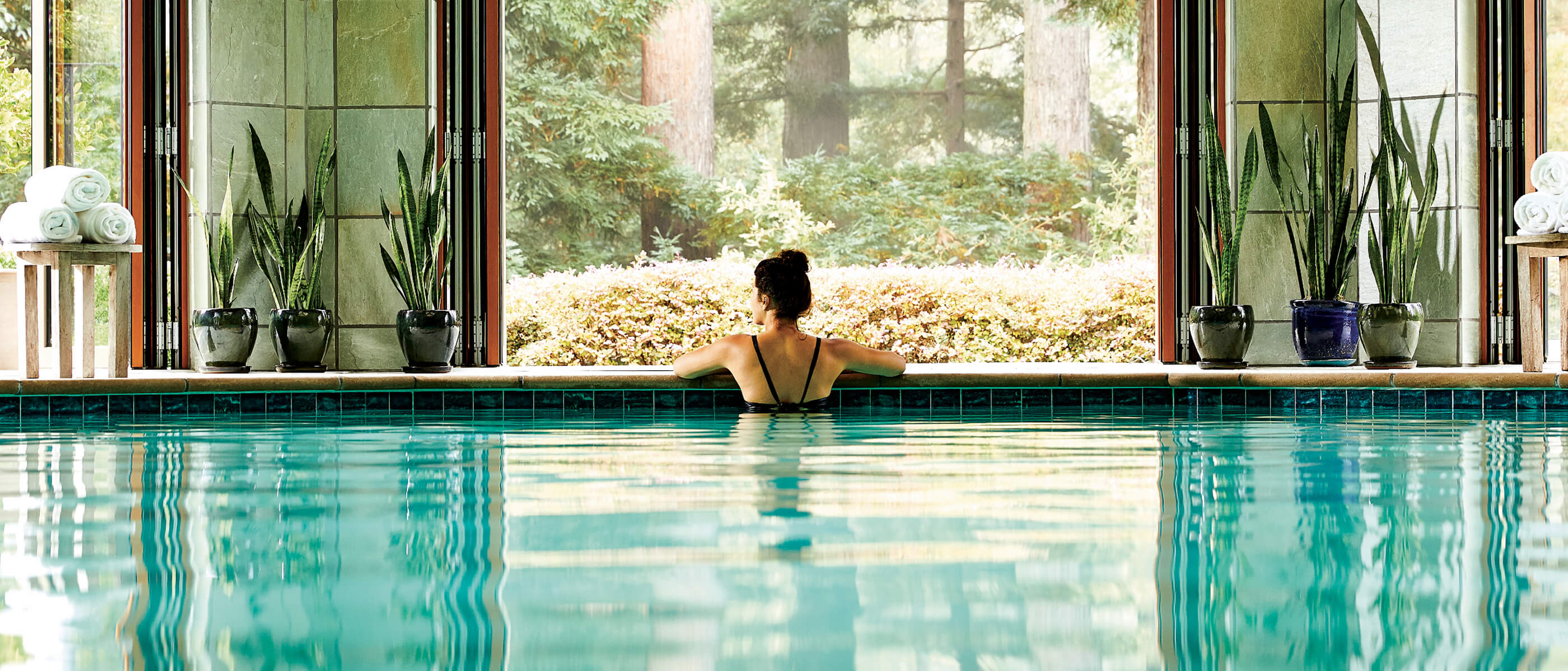 a woman in an indoor pool