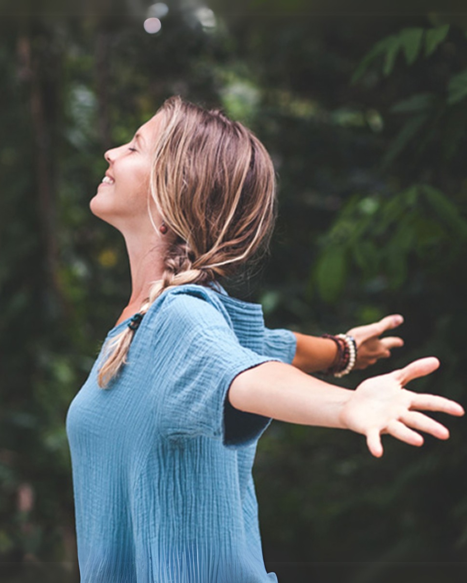 A woman spreading out her arms