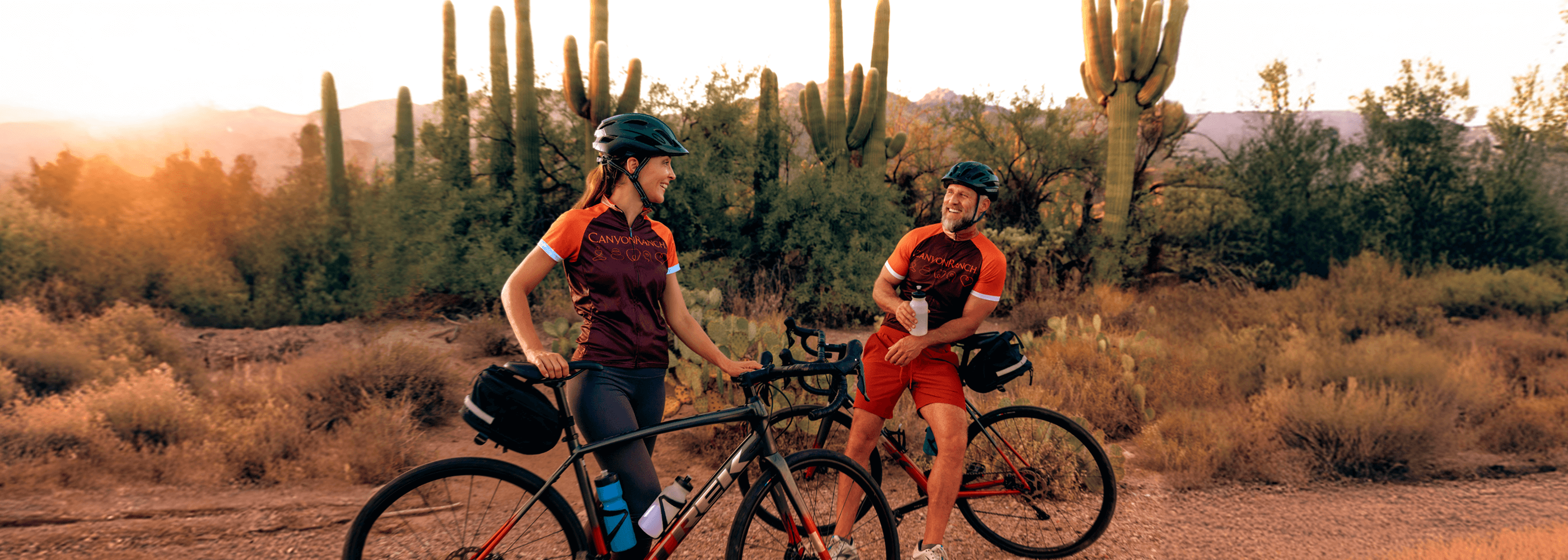 a couple biking in the desert
