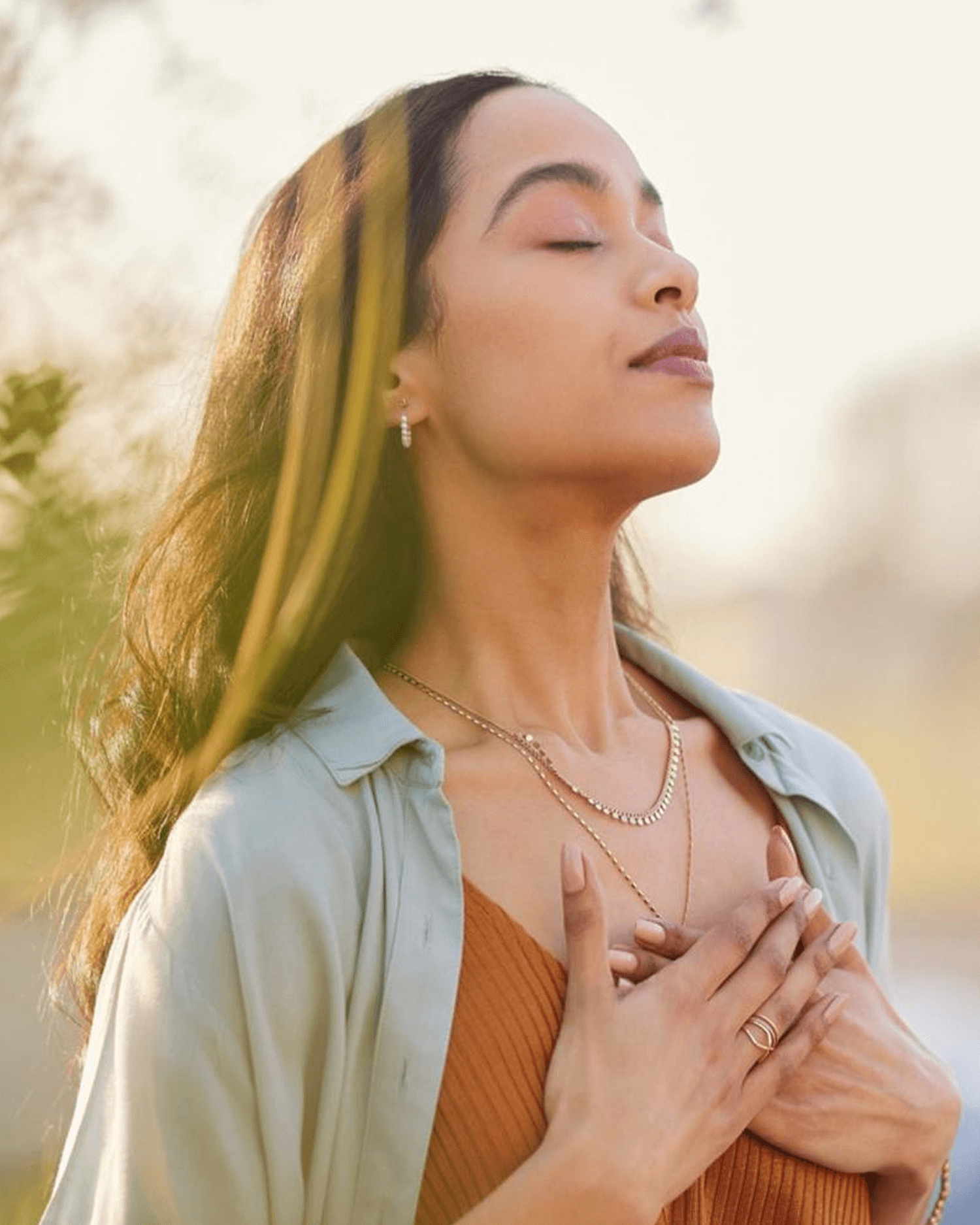 A woman holding her chest