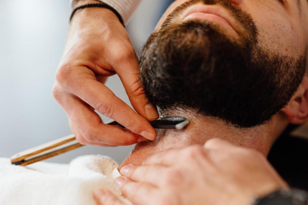 Man receiving beard trun