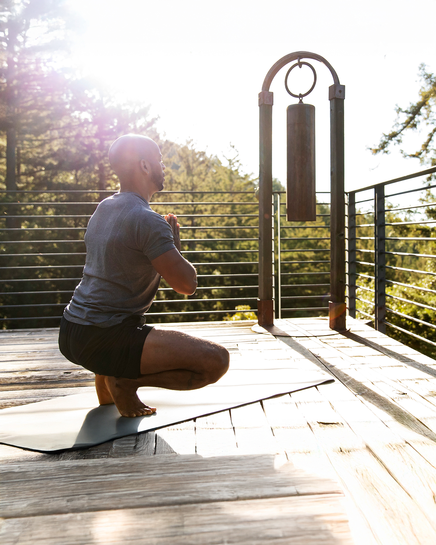 a man doing yoga at Canyon Ranch Woodside