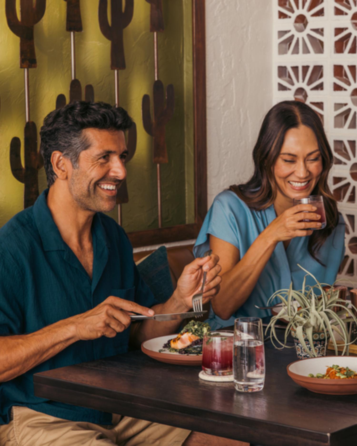 People Laughing During Dinner