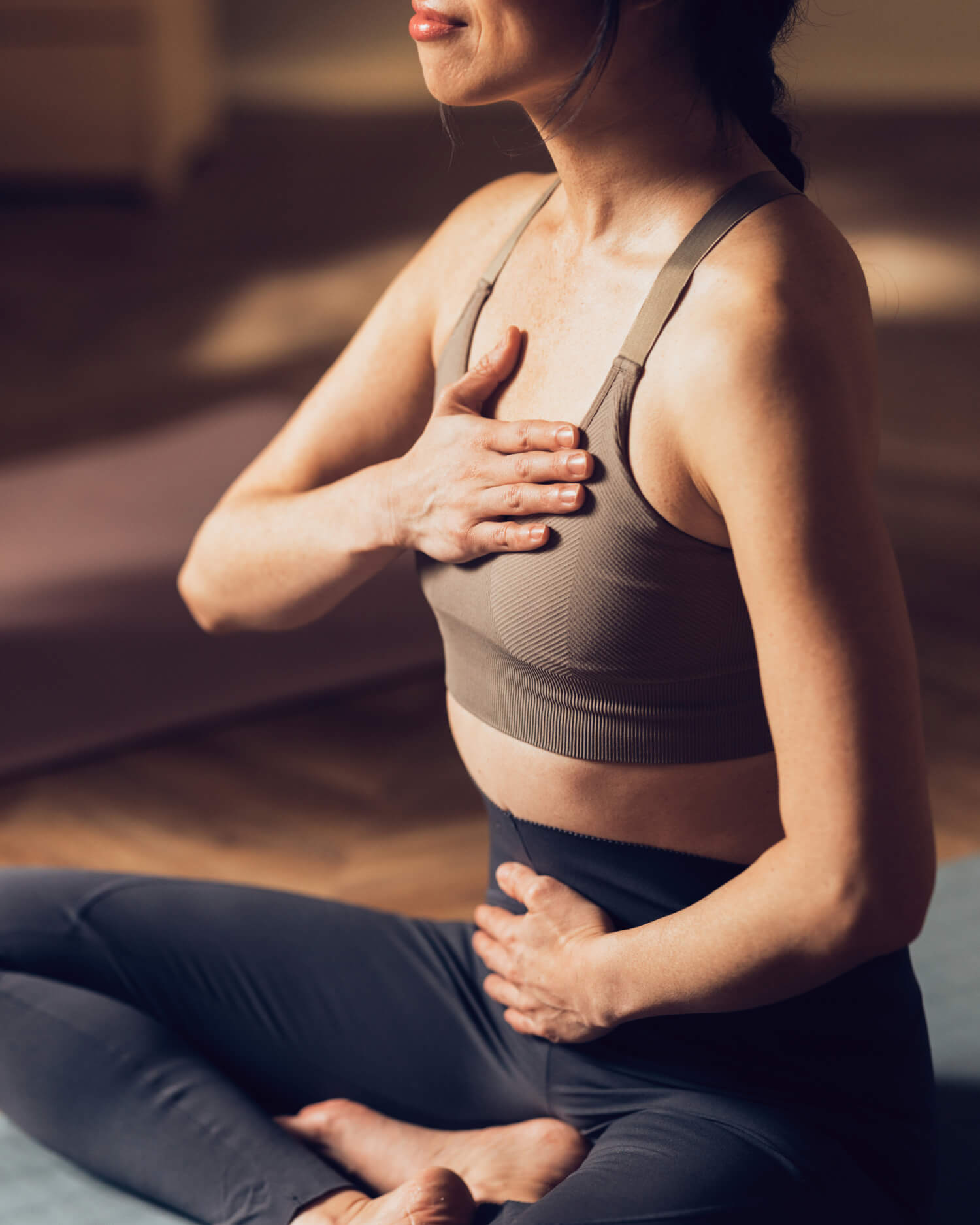 A woman holding her chest