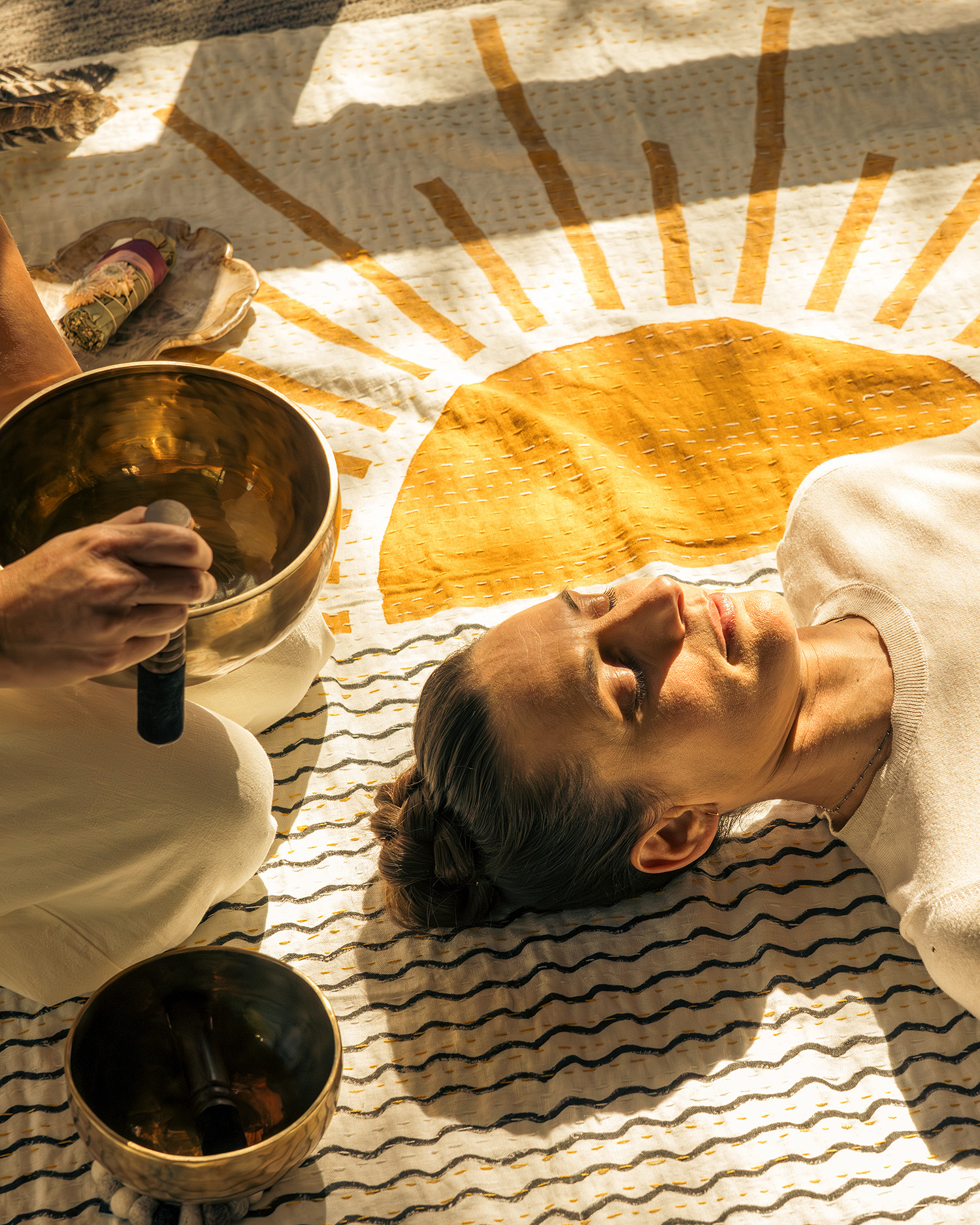 A woman getting a sound healing