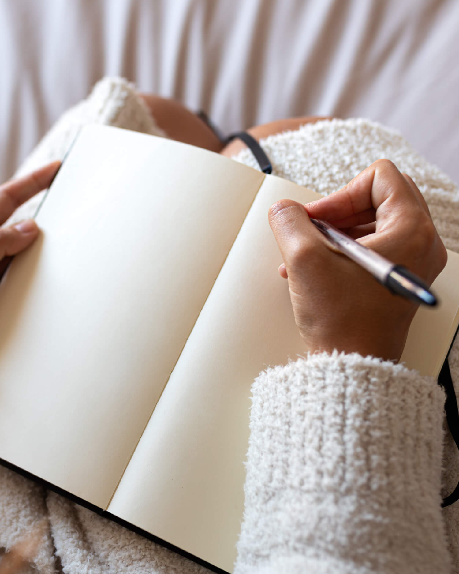 A woman writing in a journal