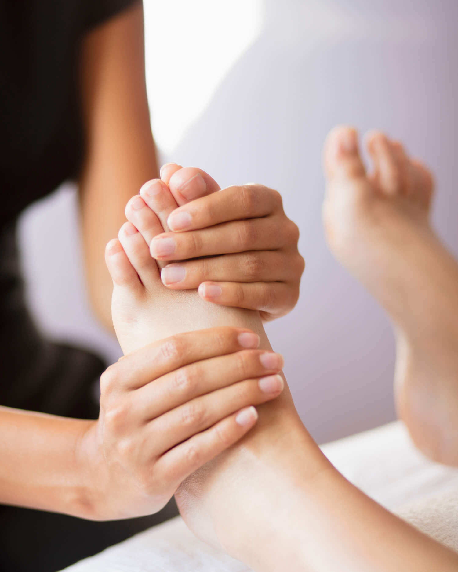 A woman getting a foot massage