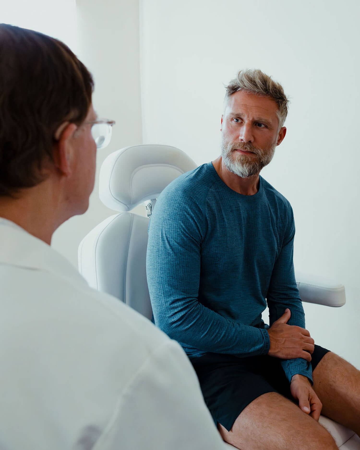 Man Receiving a Physician Consultation