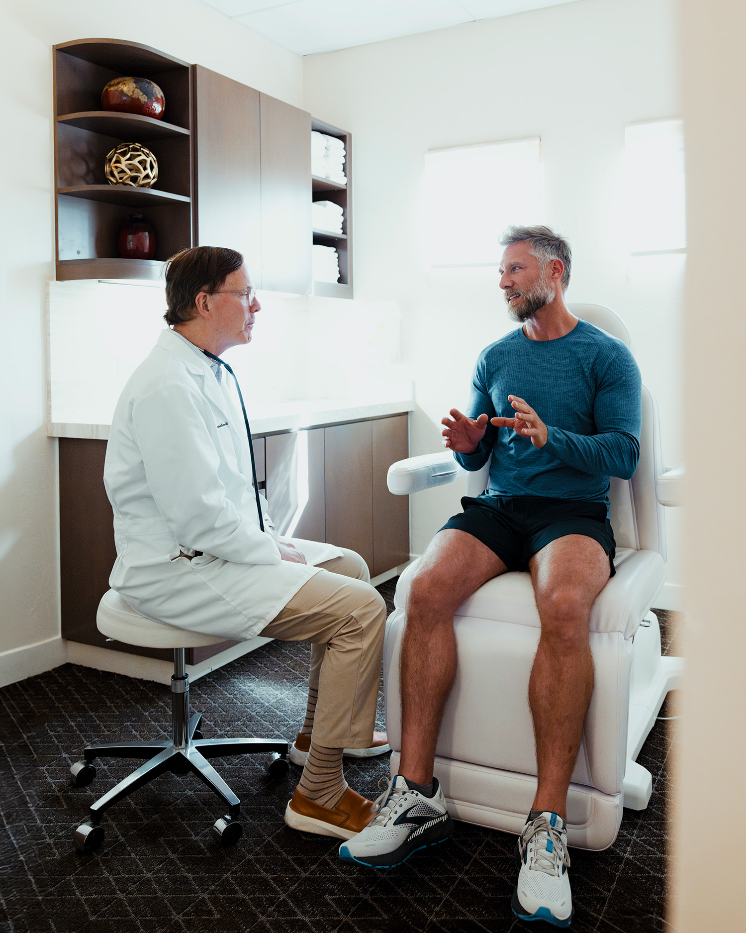 A man meeting with a doctor