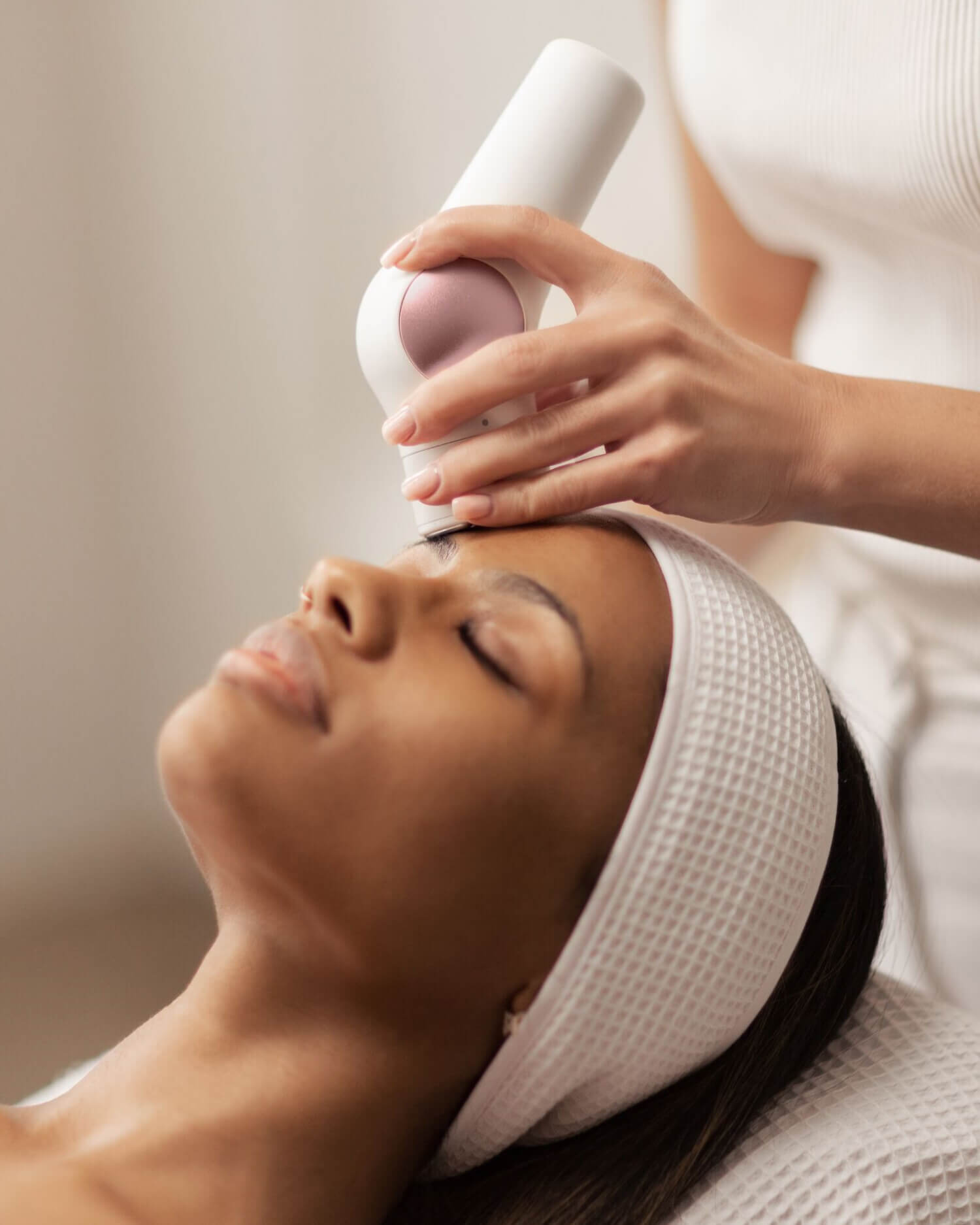 a woman getting a facial
