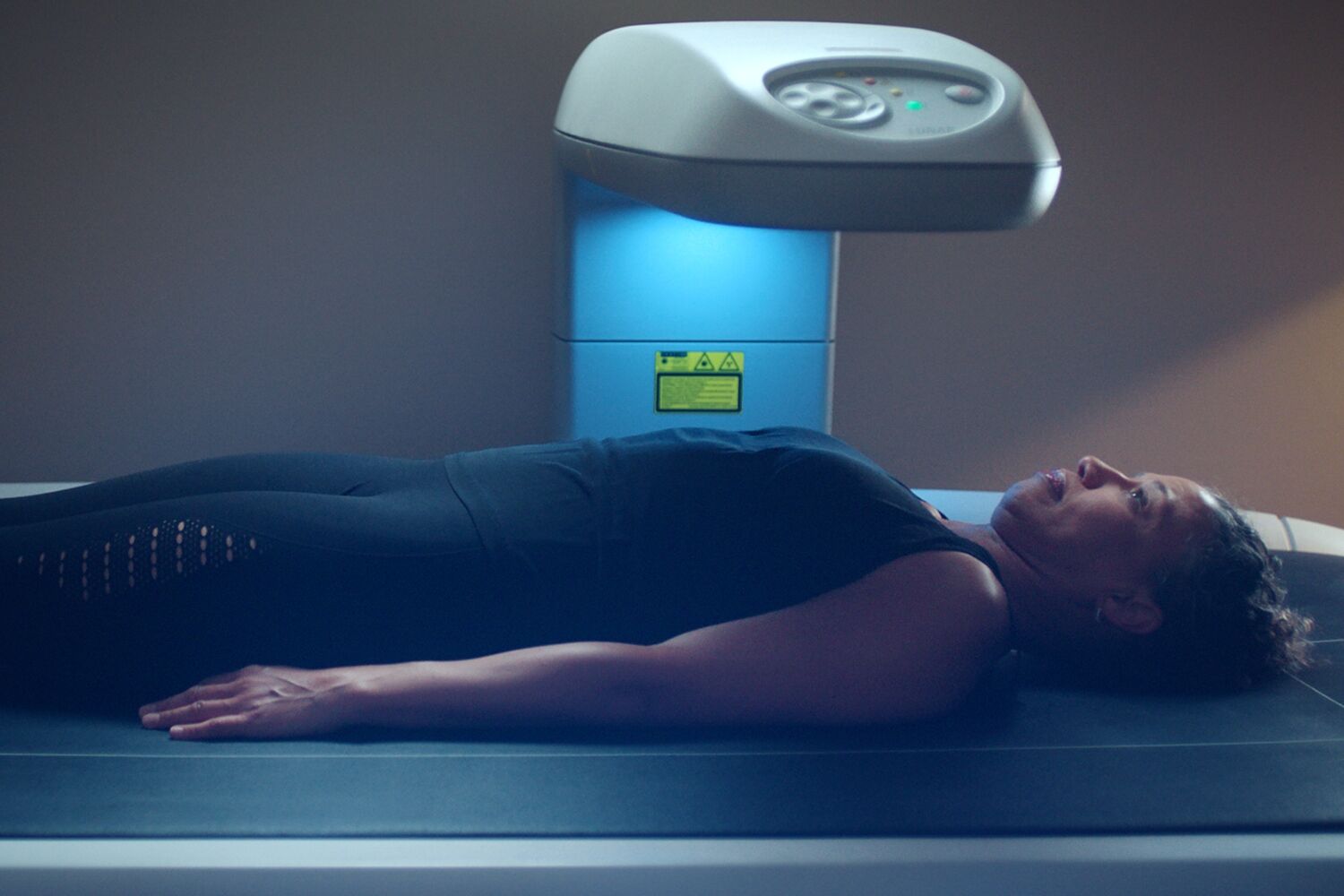 A woman getting a dexa scan