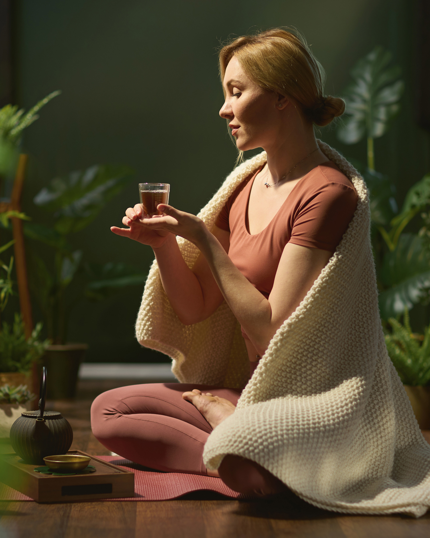 a woman drinking tea