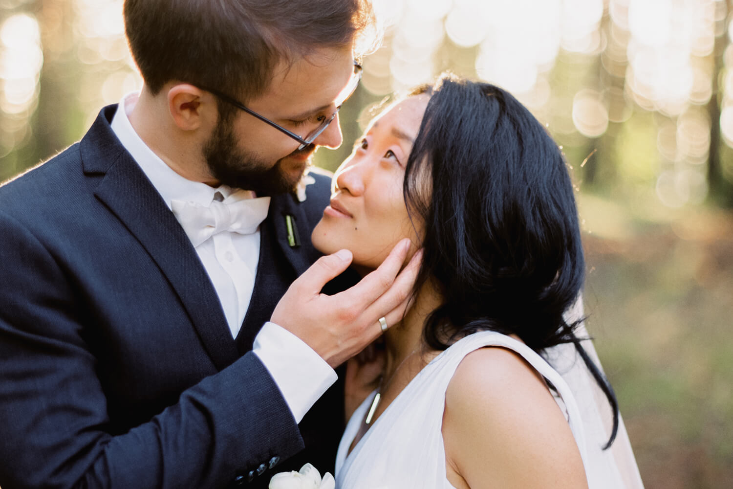 A Just Married Couple Looking into Each Others Eyes 