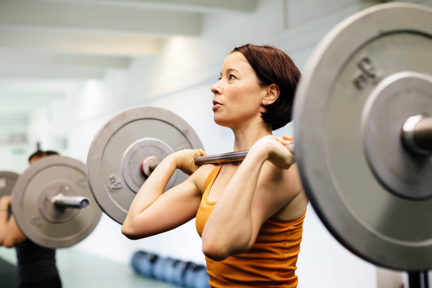 a woman lifting weights