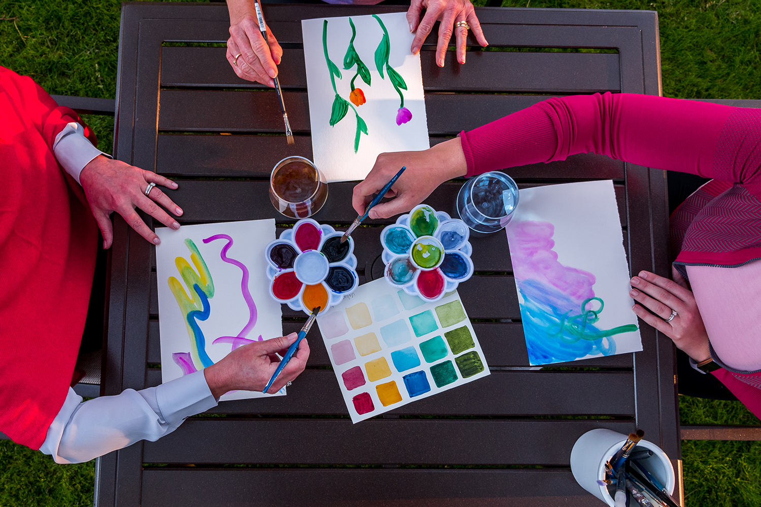 a group of people painting