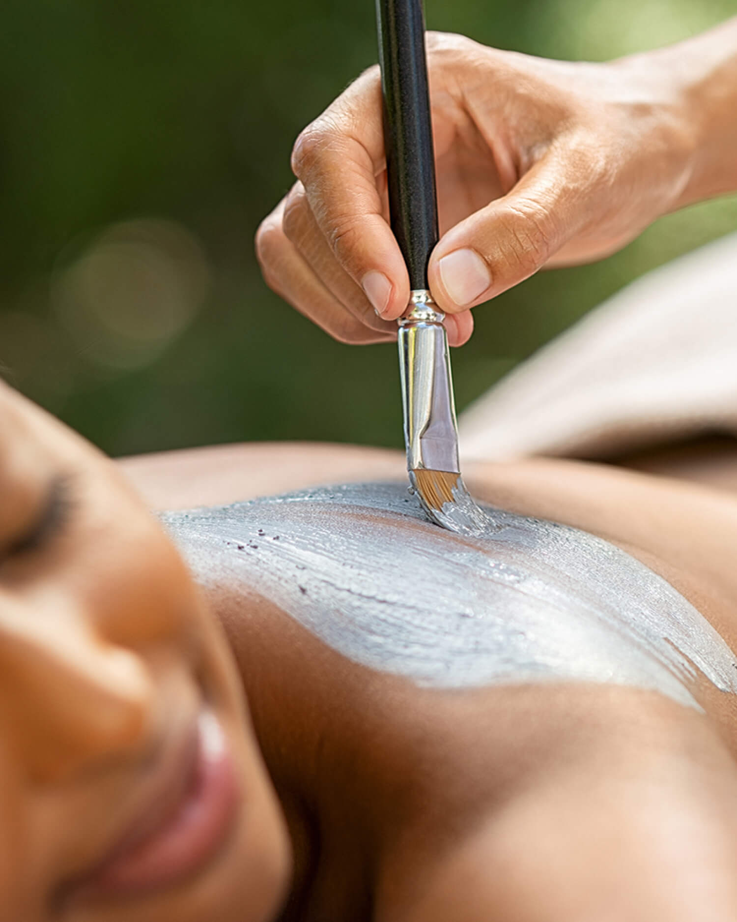 A woman getting a whole body treatment at Canyon Ranch Spa