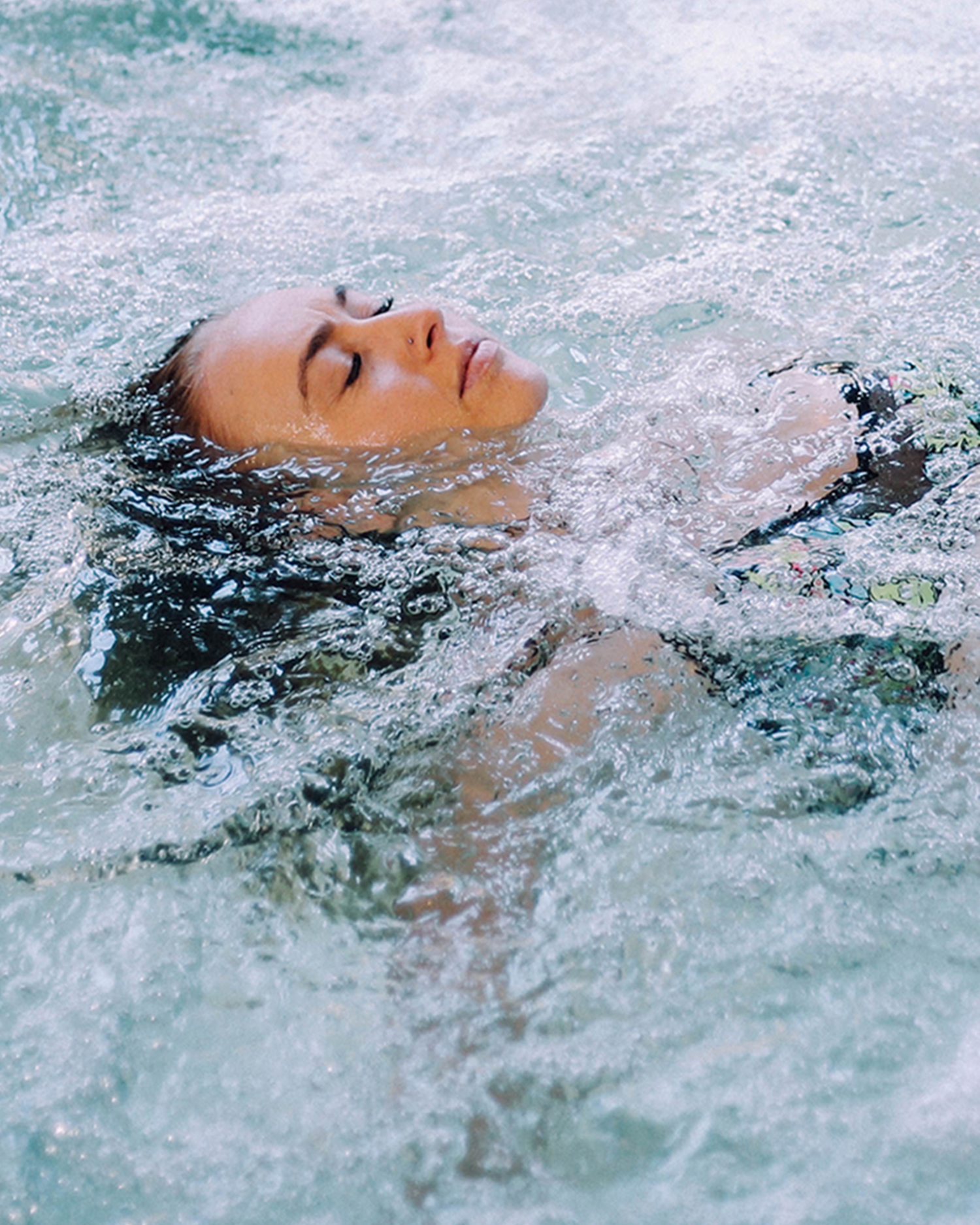 a woman swimming in water