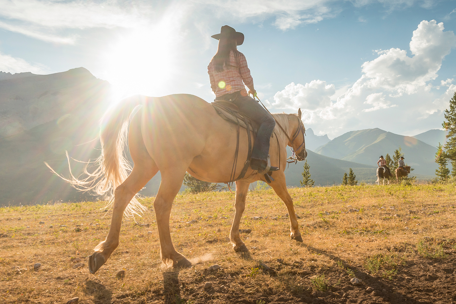 a girl riding a horse