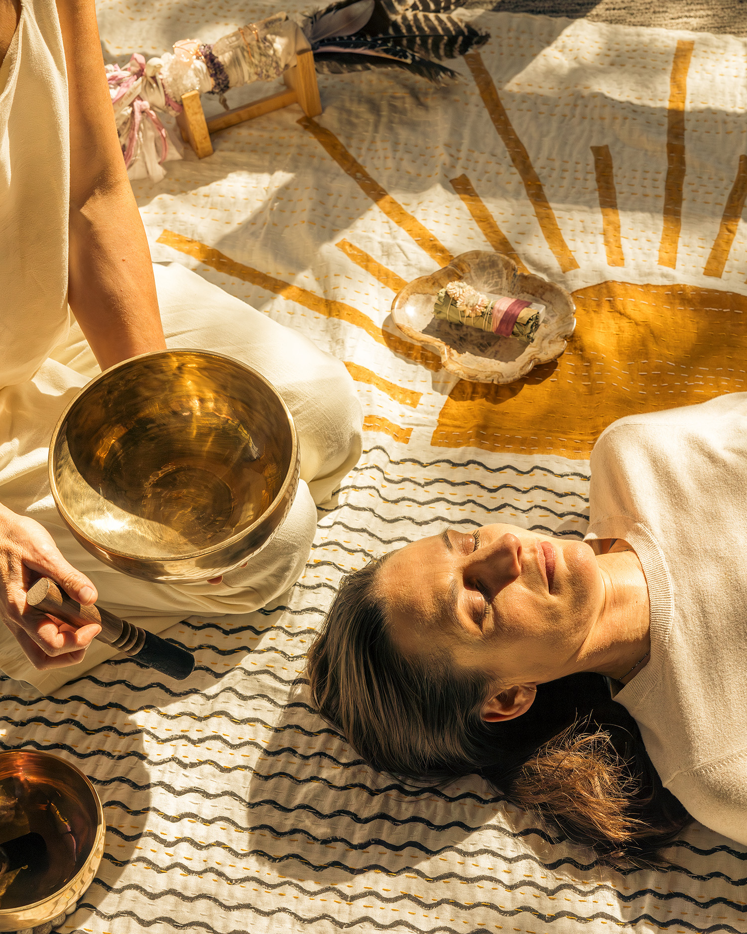 a woman in a sound bath meditation