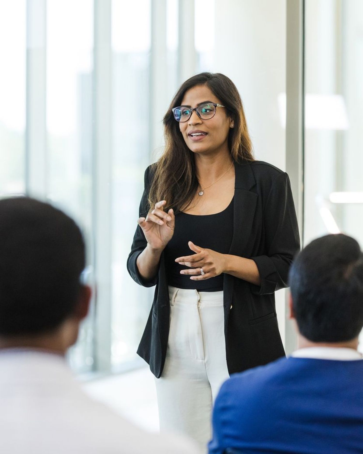 a woman giving a medical education lecture