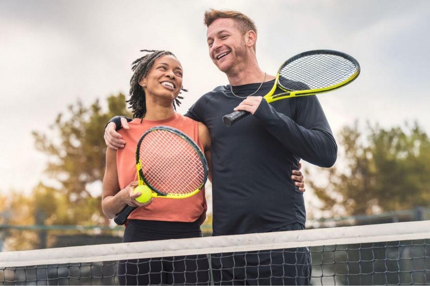 a woman playing pickleball