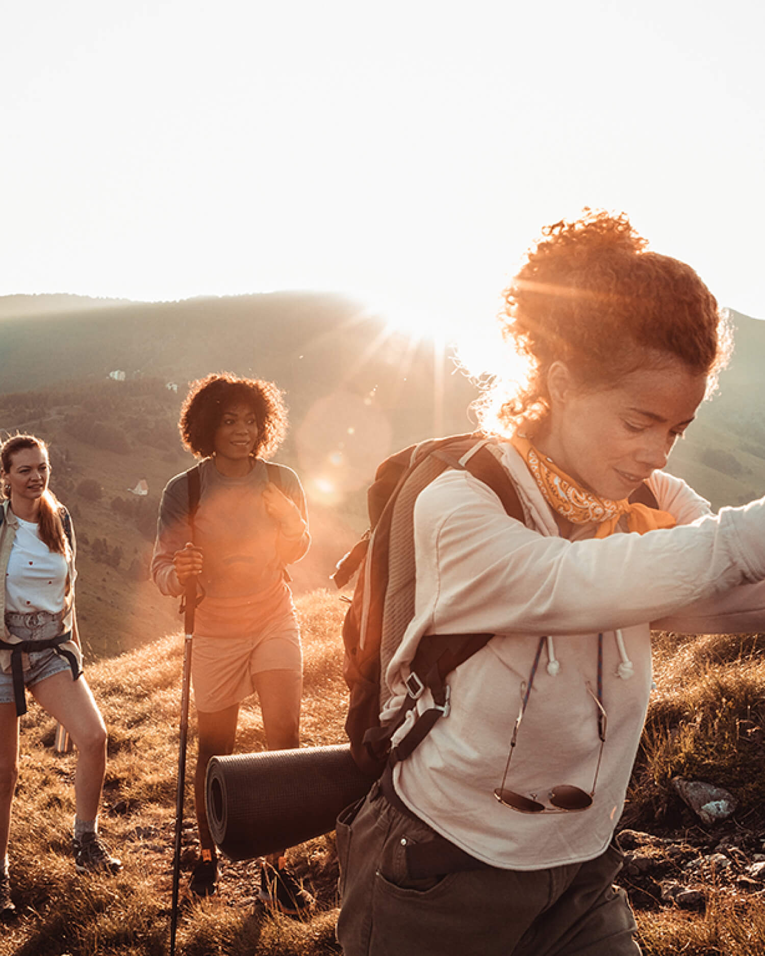 Group of Woman Hiking up a Mountain