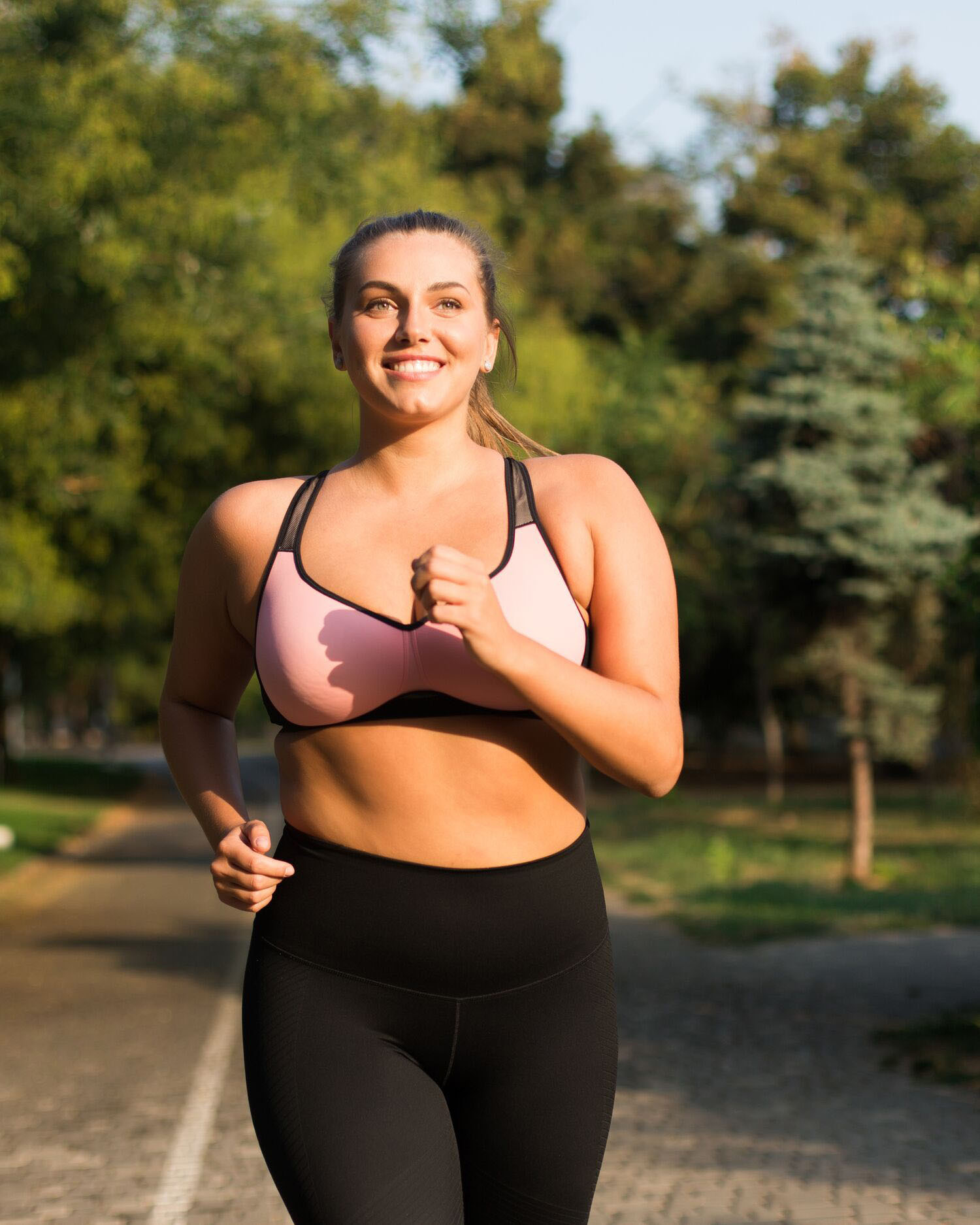 A Woman Running Outdoors