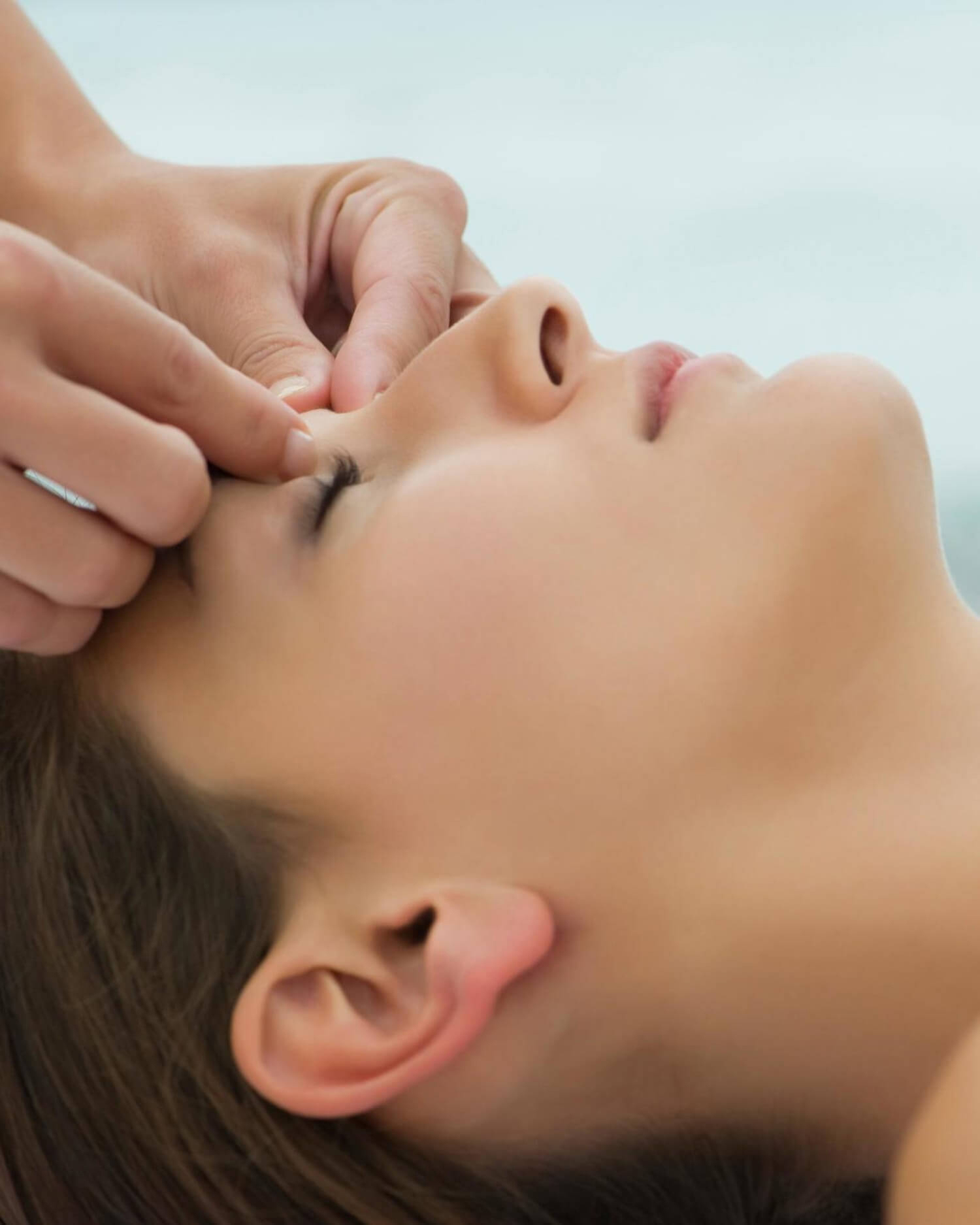 Woman Receiving a Shiatsu Treatment
