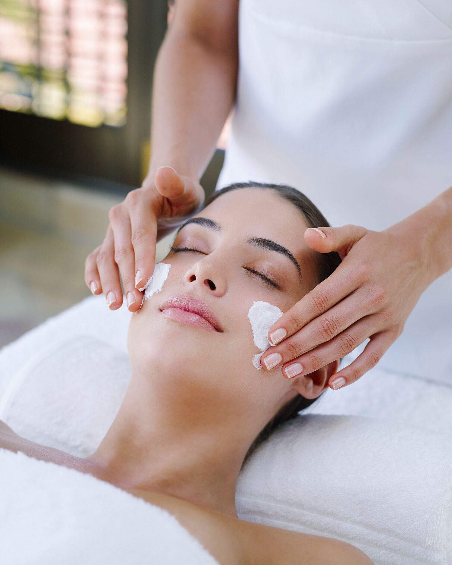 A woman getting the Omorovicza Gold Hydralifting Facial