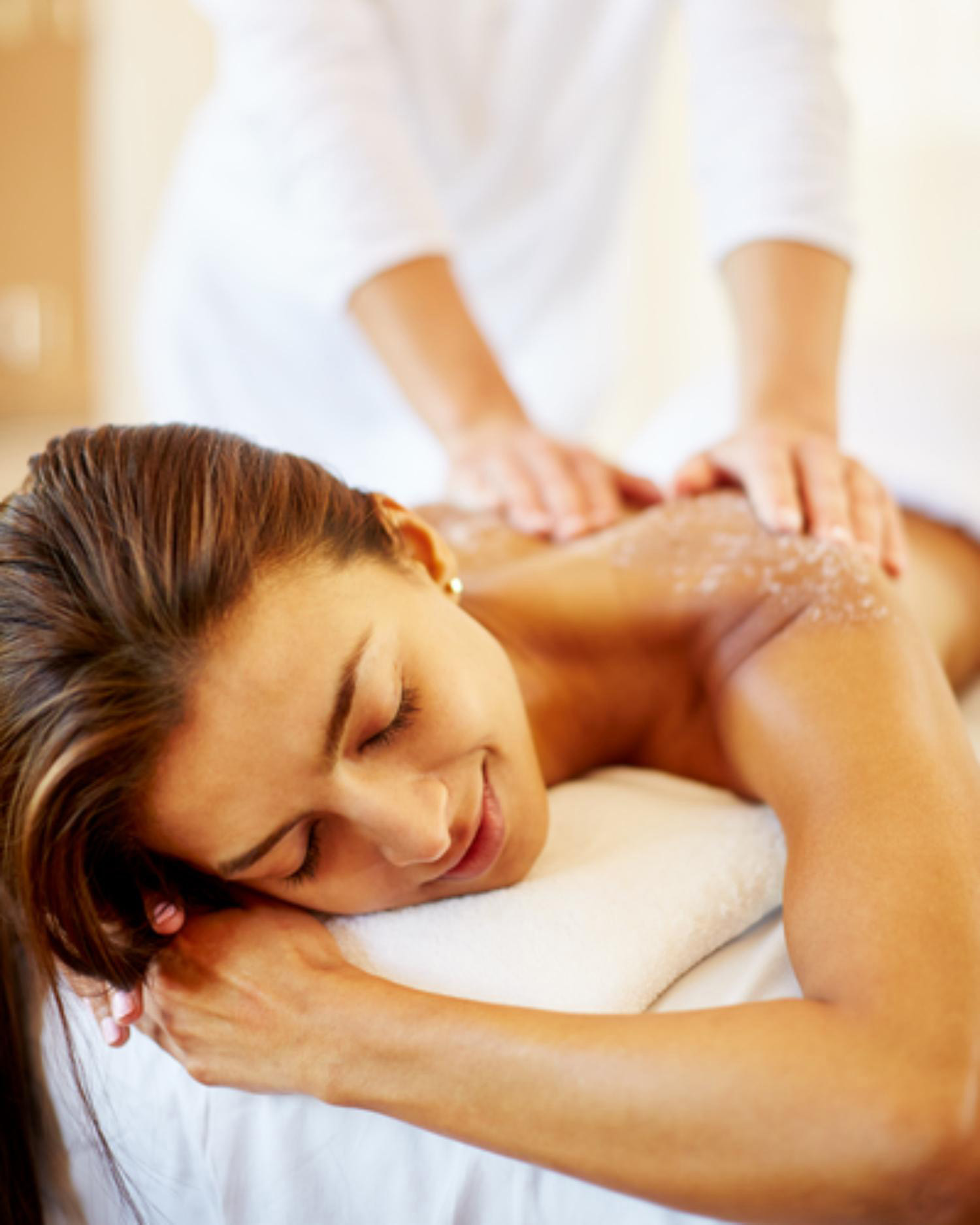 A woman having a massage at Canyon Ranch Wellness Spa Resort