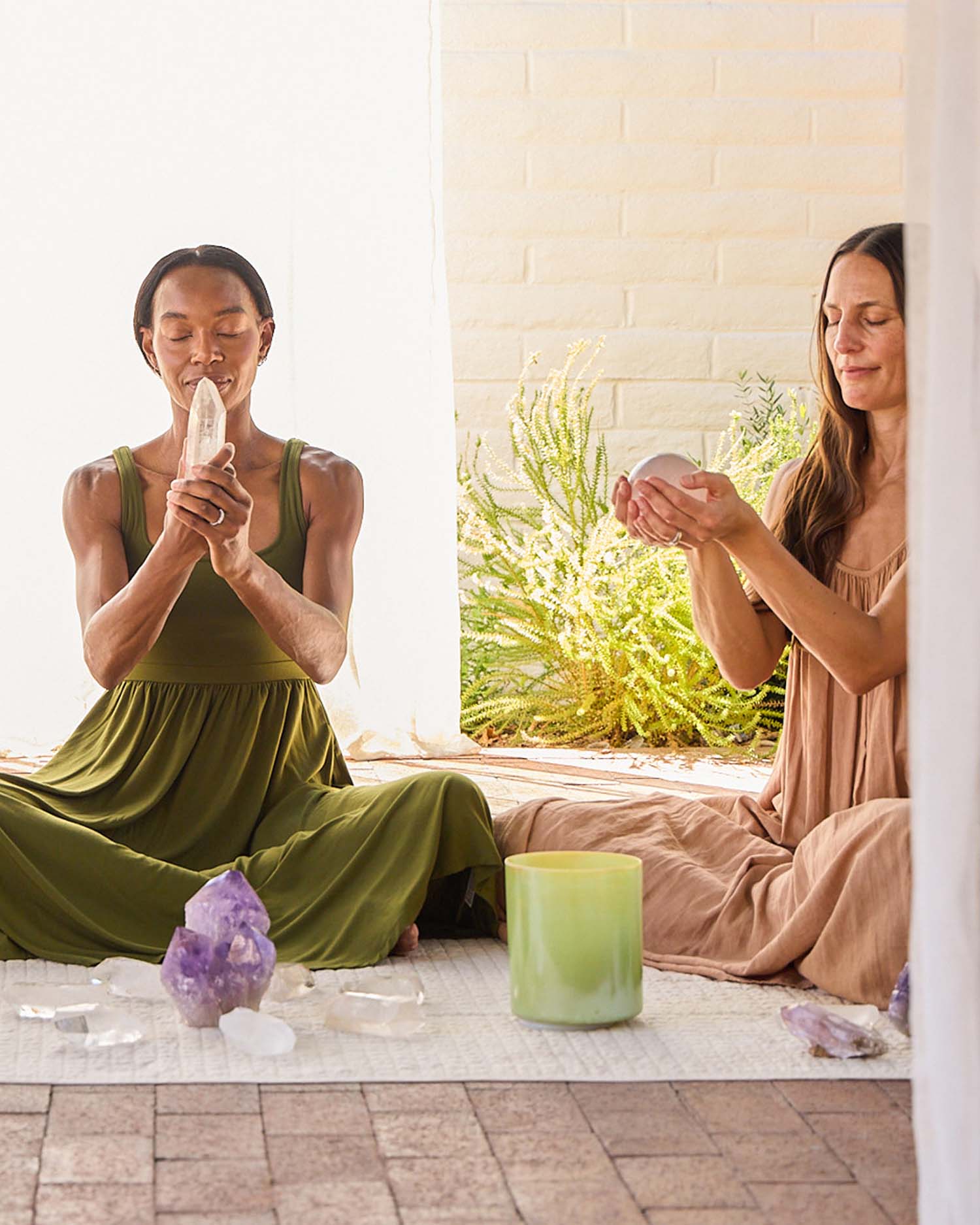 Three Women Meditating with Crystals 