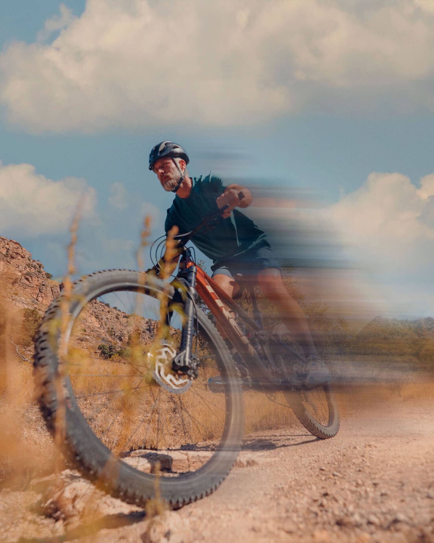 Man Mountainbiking in the Desert