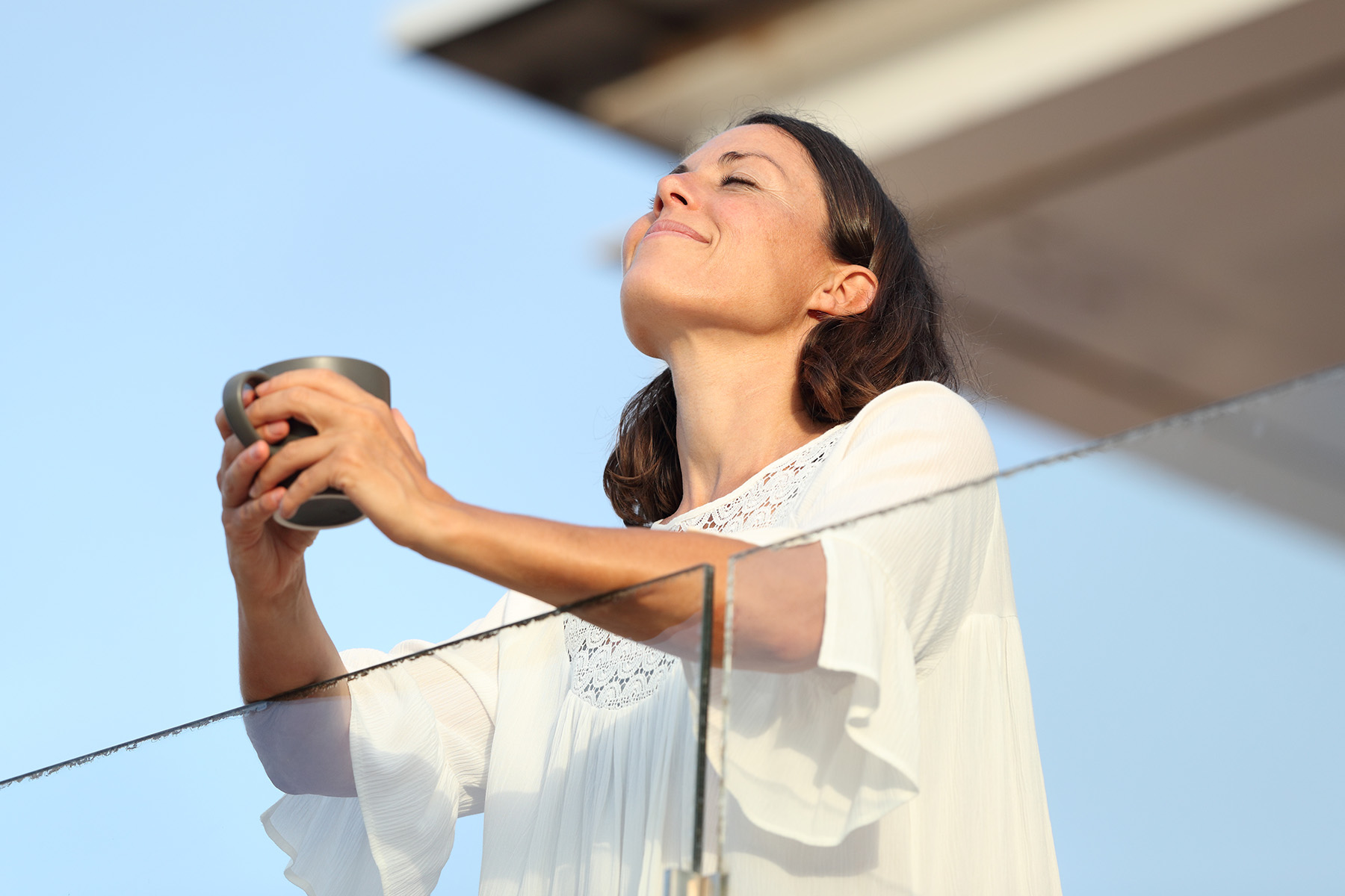 a woman drinking coffee