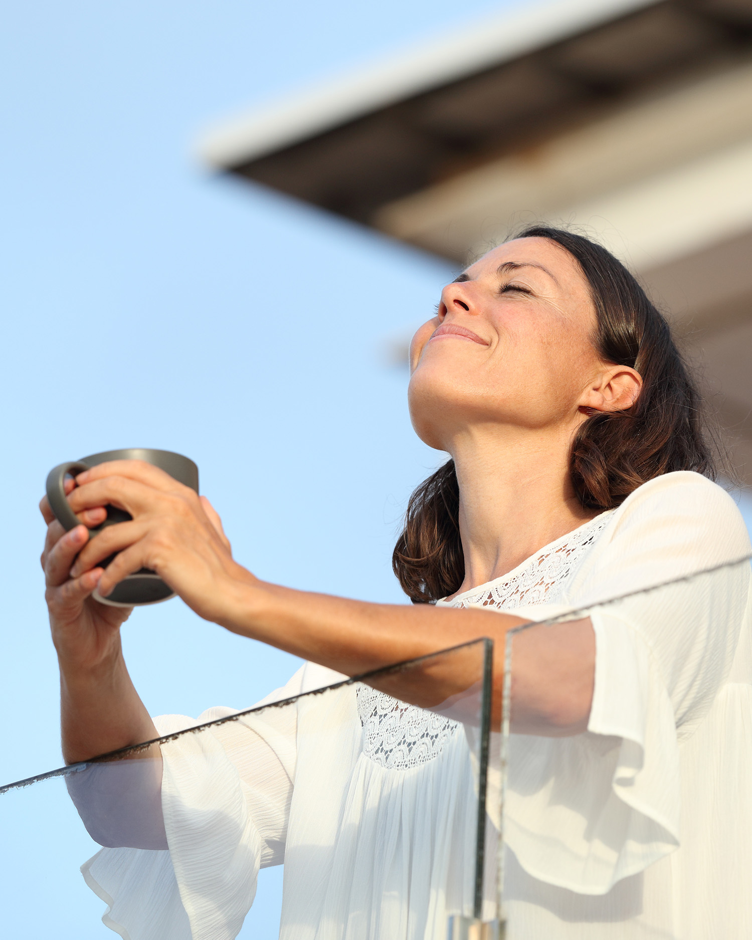a woman drinking coffee