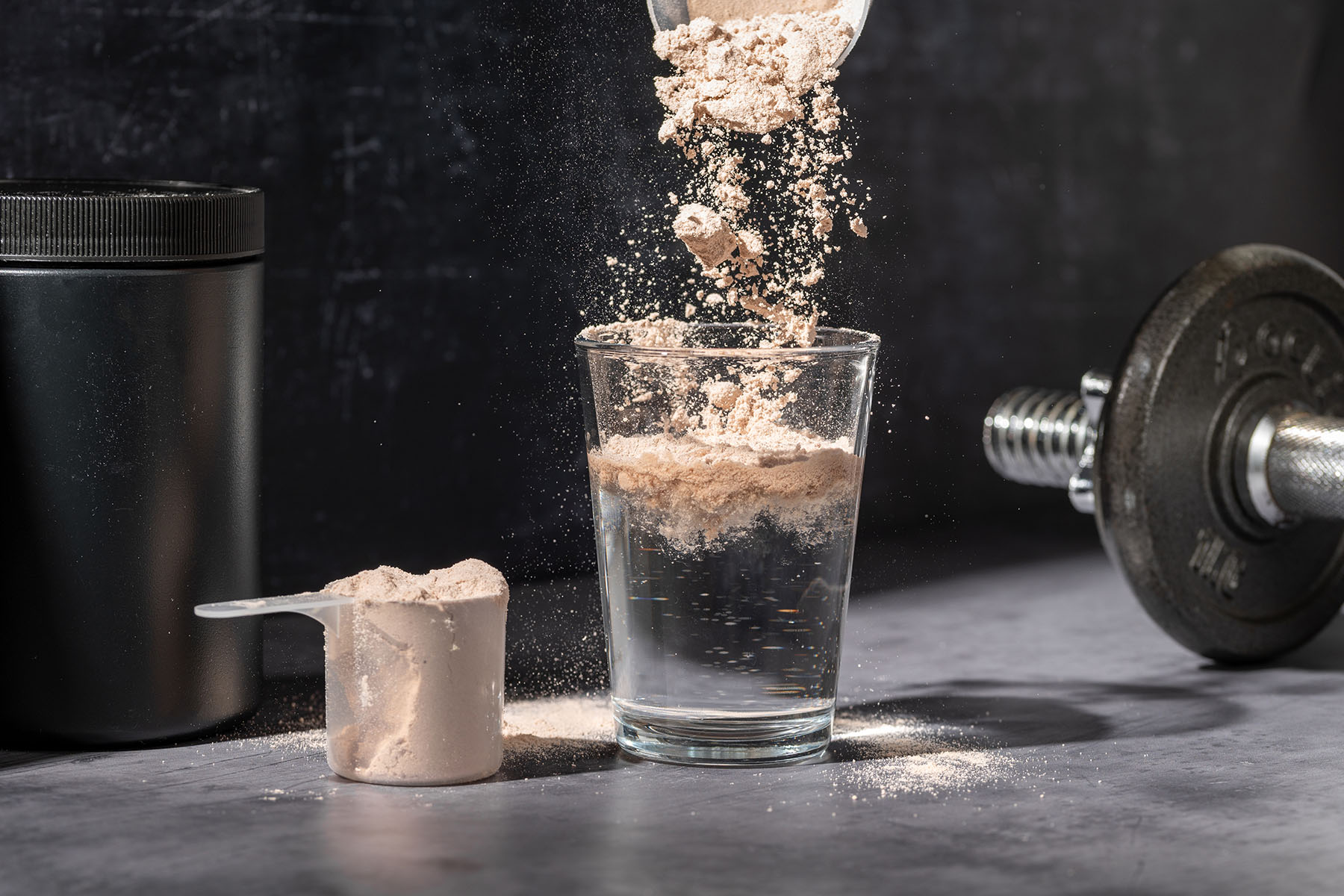 someone making a protein shake