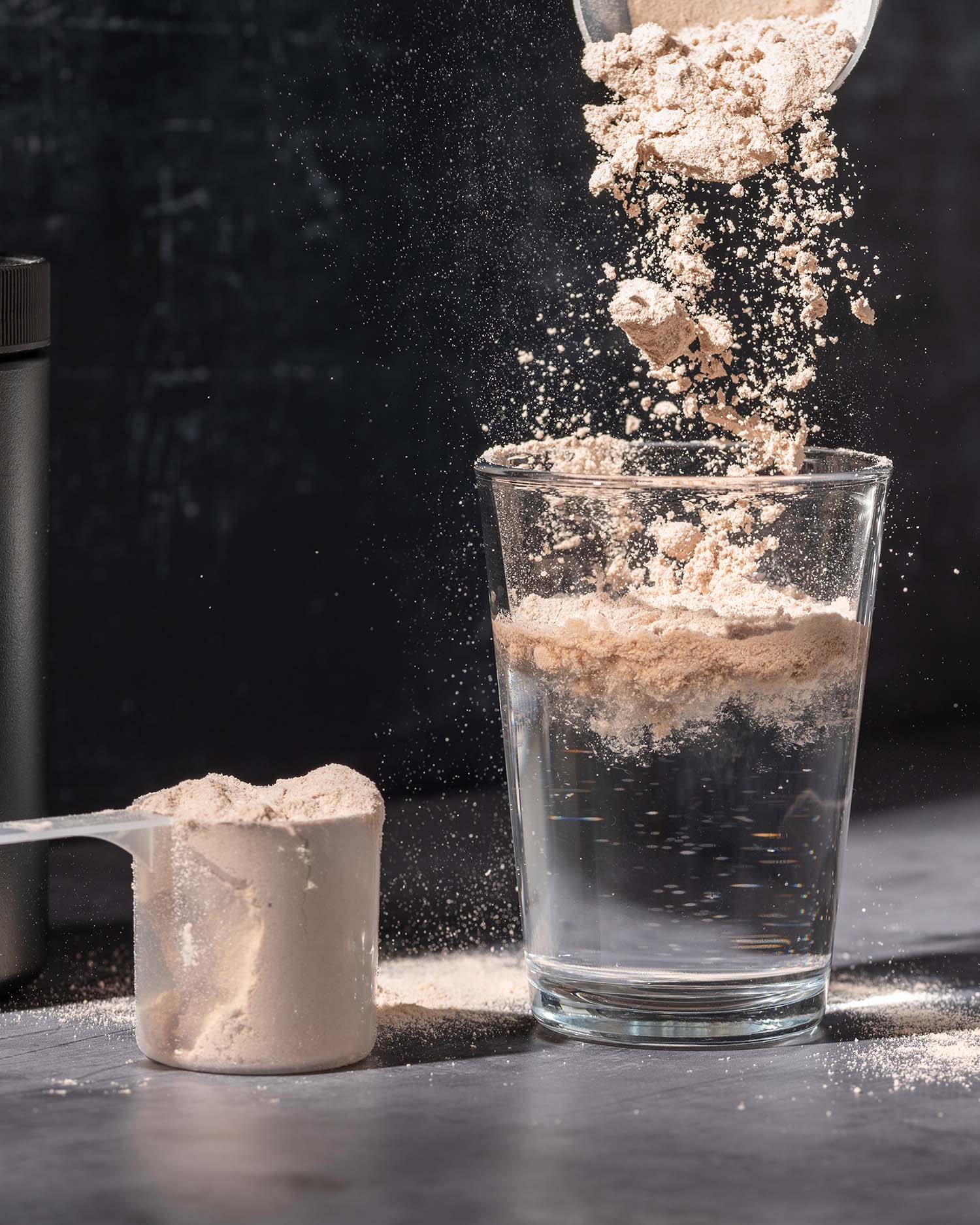 someone making a protein shake