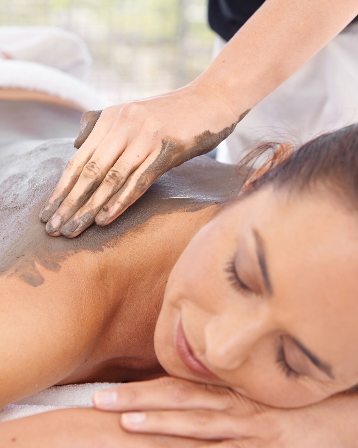 Woman enjoying a Hungarian Scrub Treatment