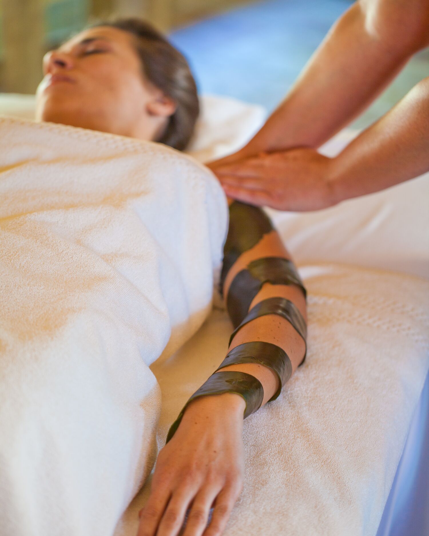 Woman enjoying an Organic Seaweed Leaf Cocoon Treatment
