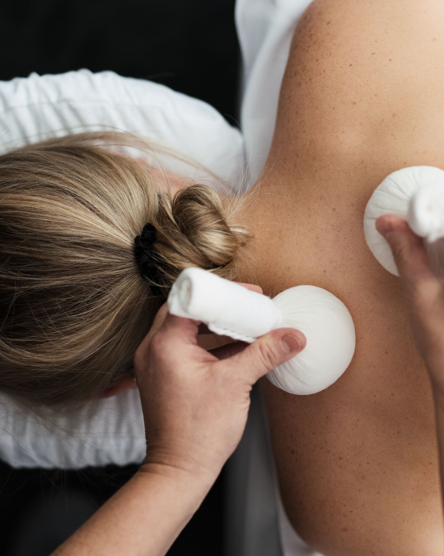 Woman enjoying a Coconut Melt Treatment