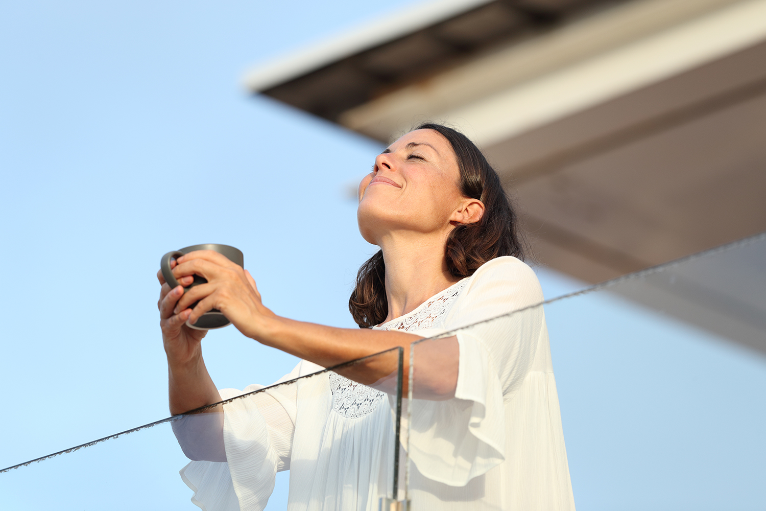a woman drinking coffee
