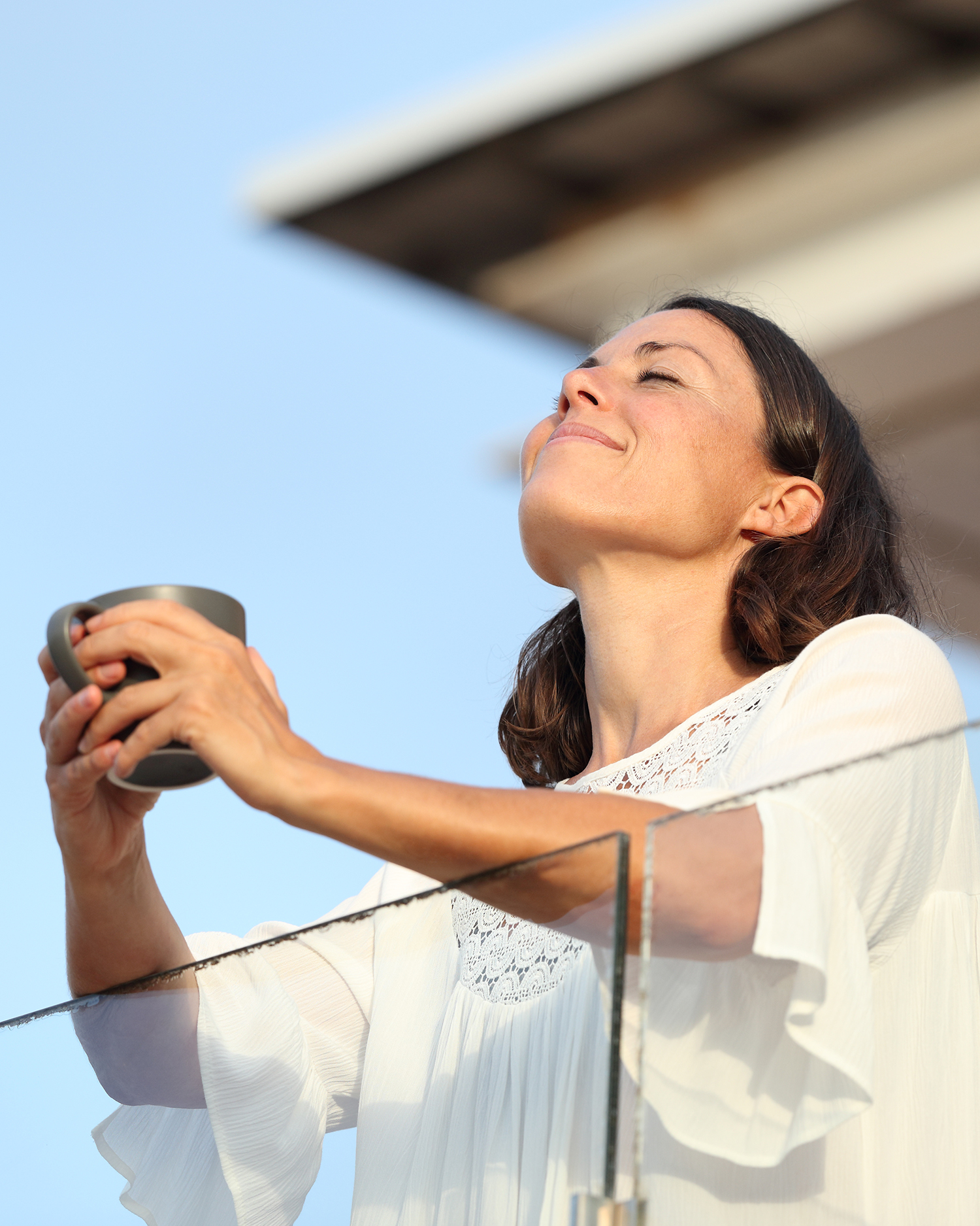 a woman drinking coffee