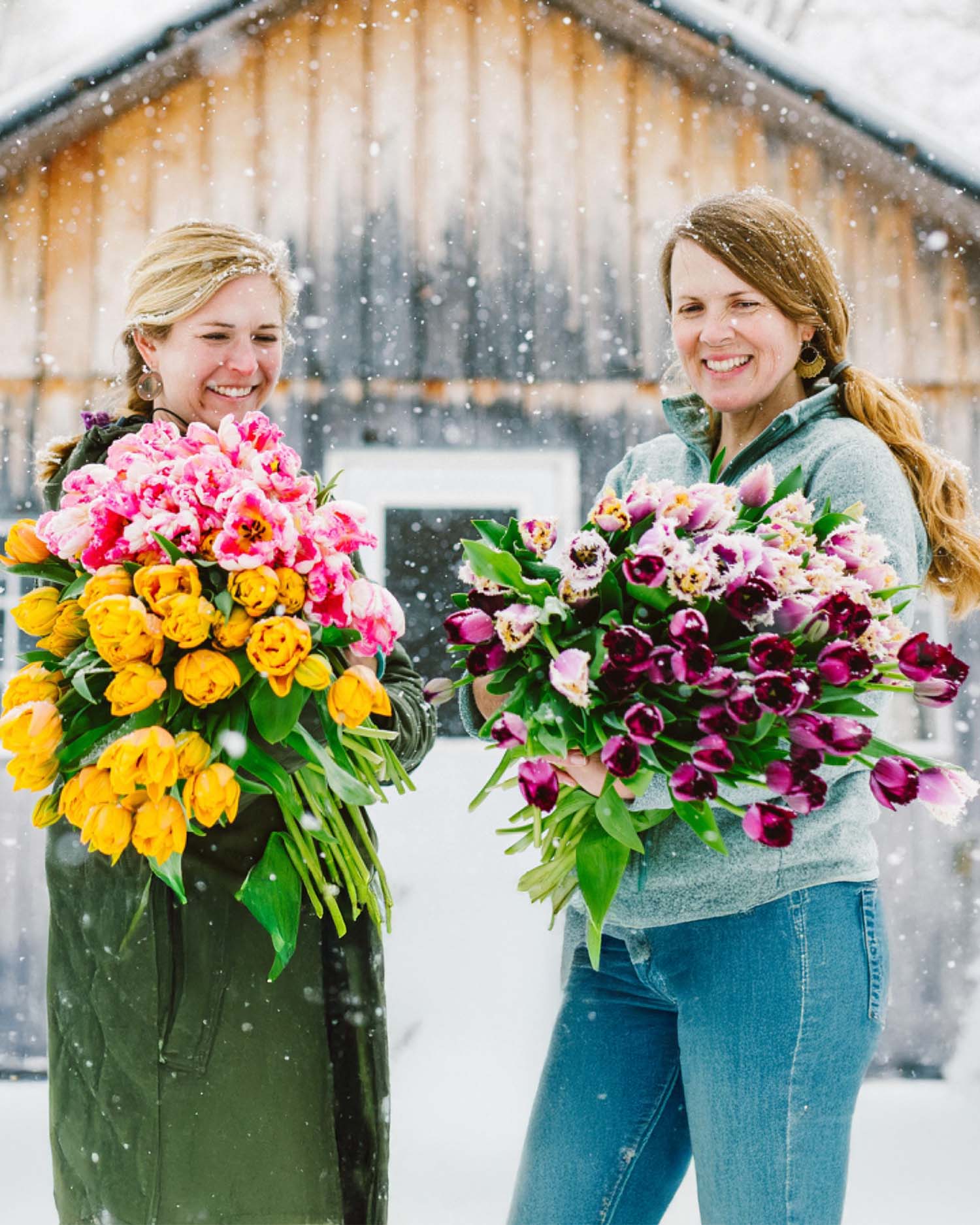 two women holding flowers