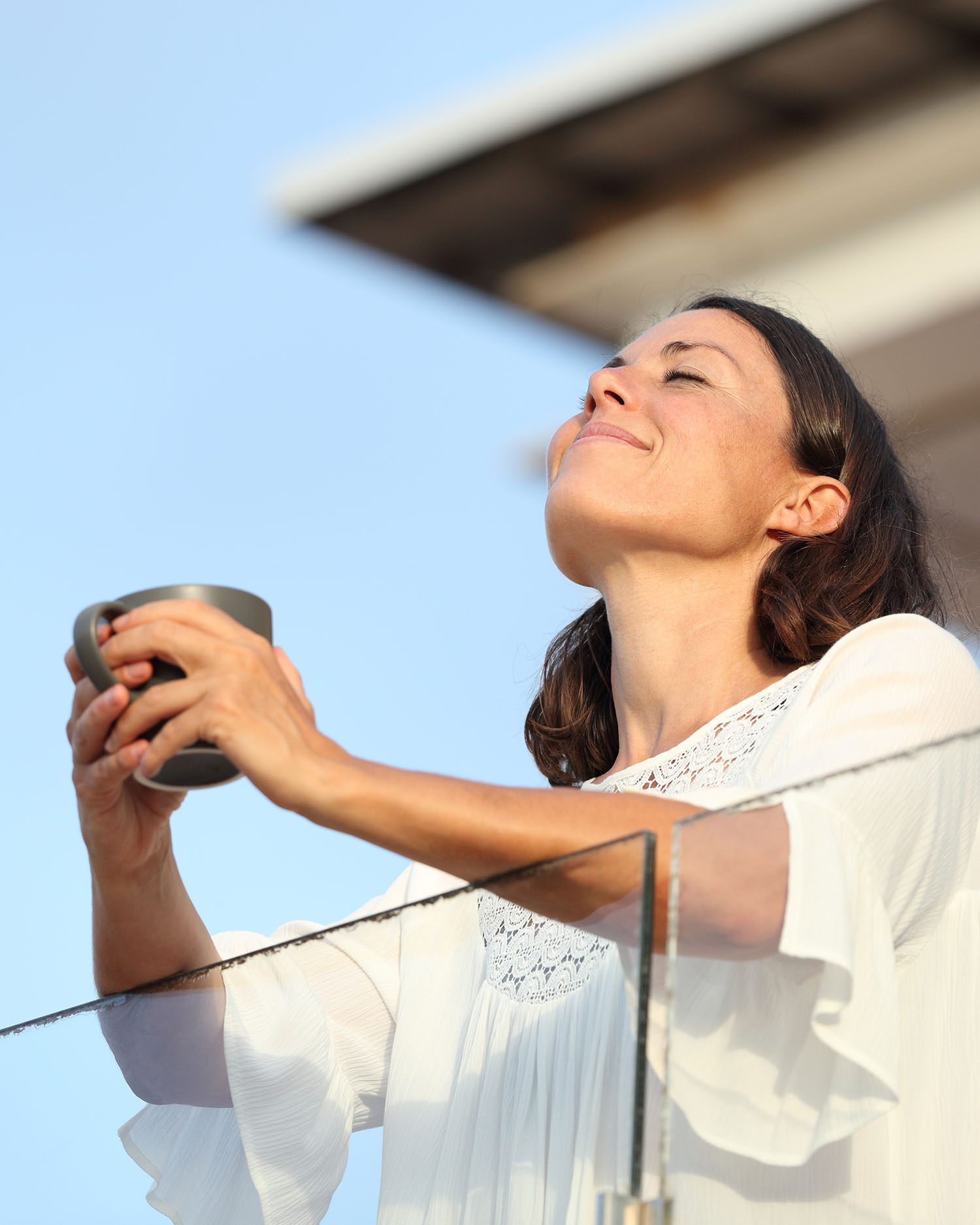 a woman drinking coffee