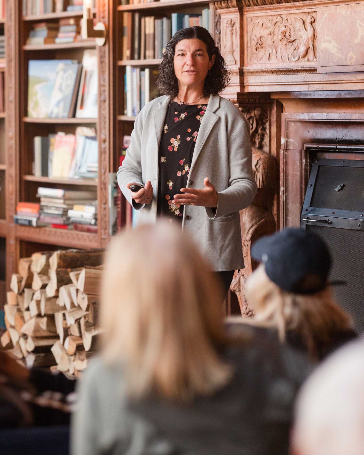 an expert speaking in front of guests