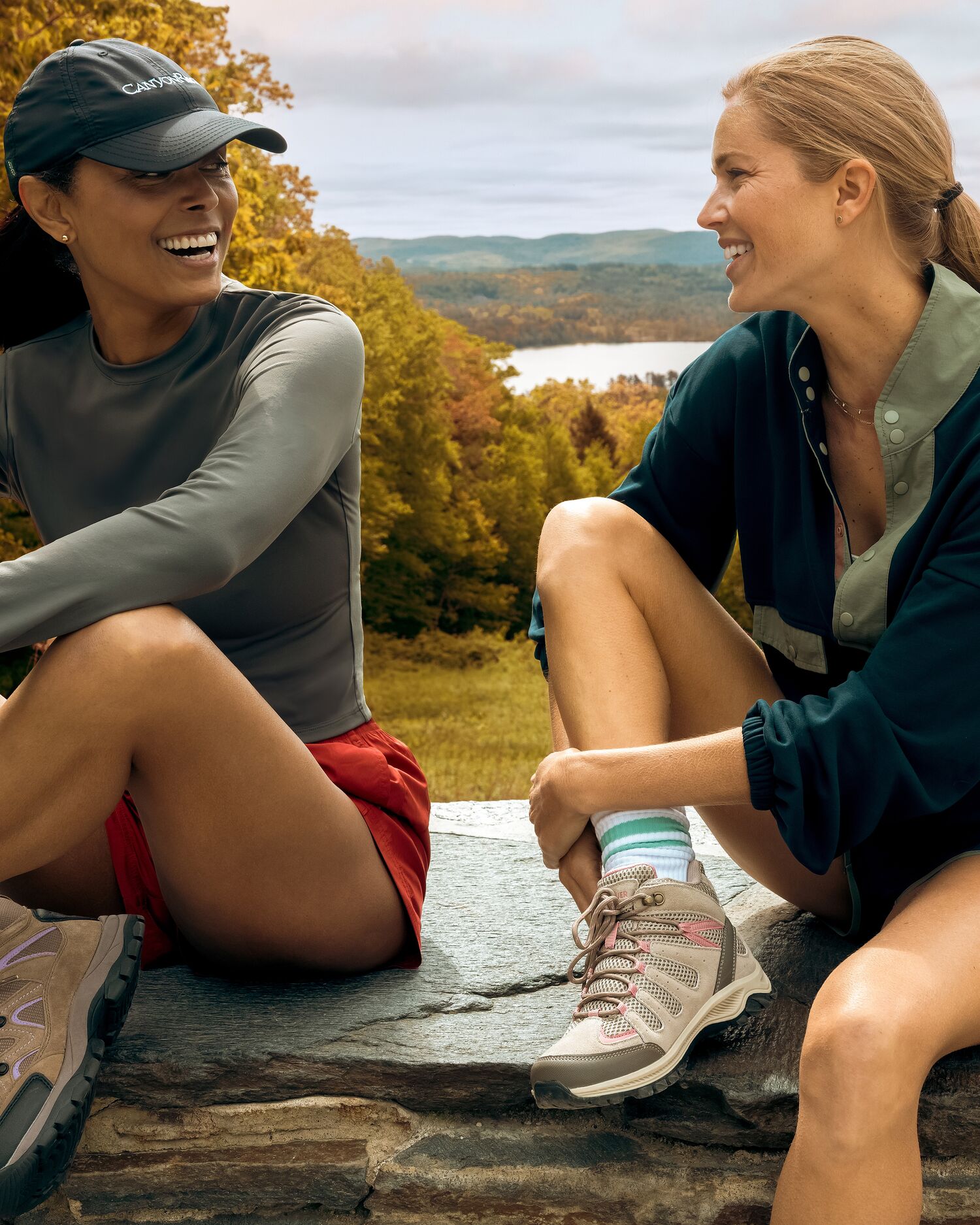 Two Woman Sitting after a Walk in Fall Foliage 