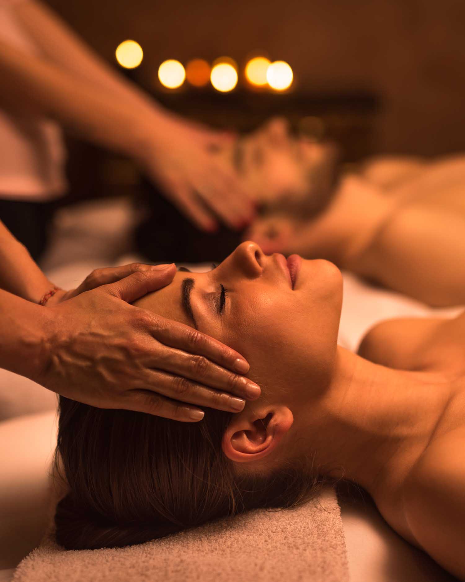 A man and woman getting a massage