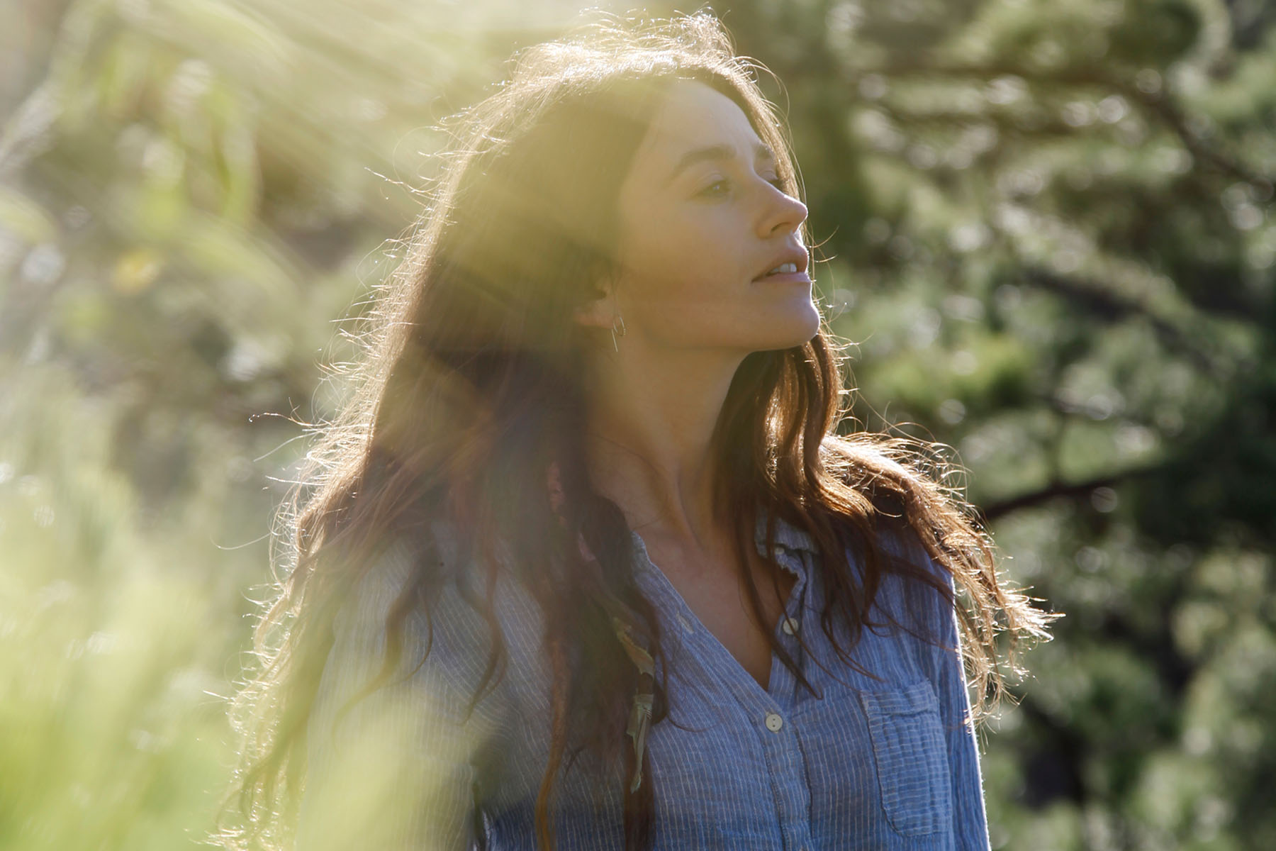A woman smiling serenly