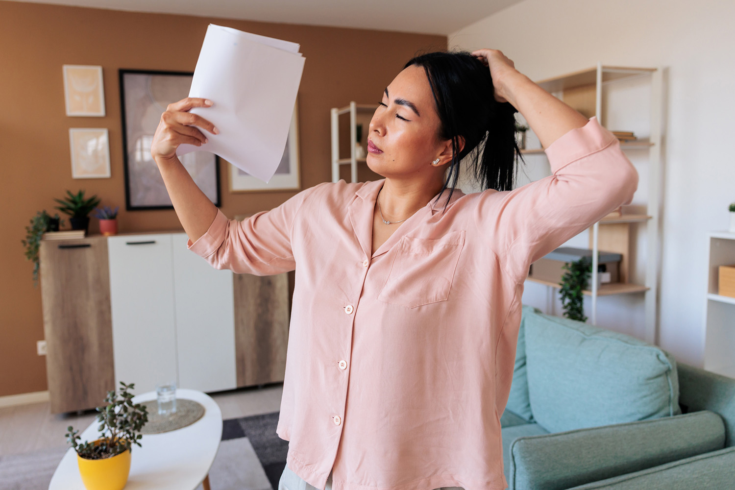 A menopausal woman experiencing hot flashes