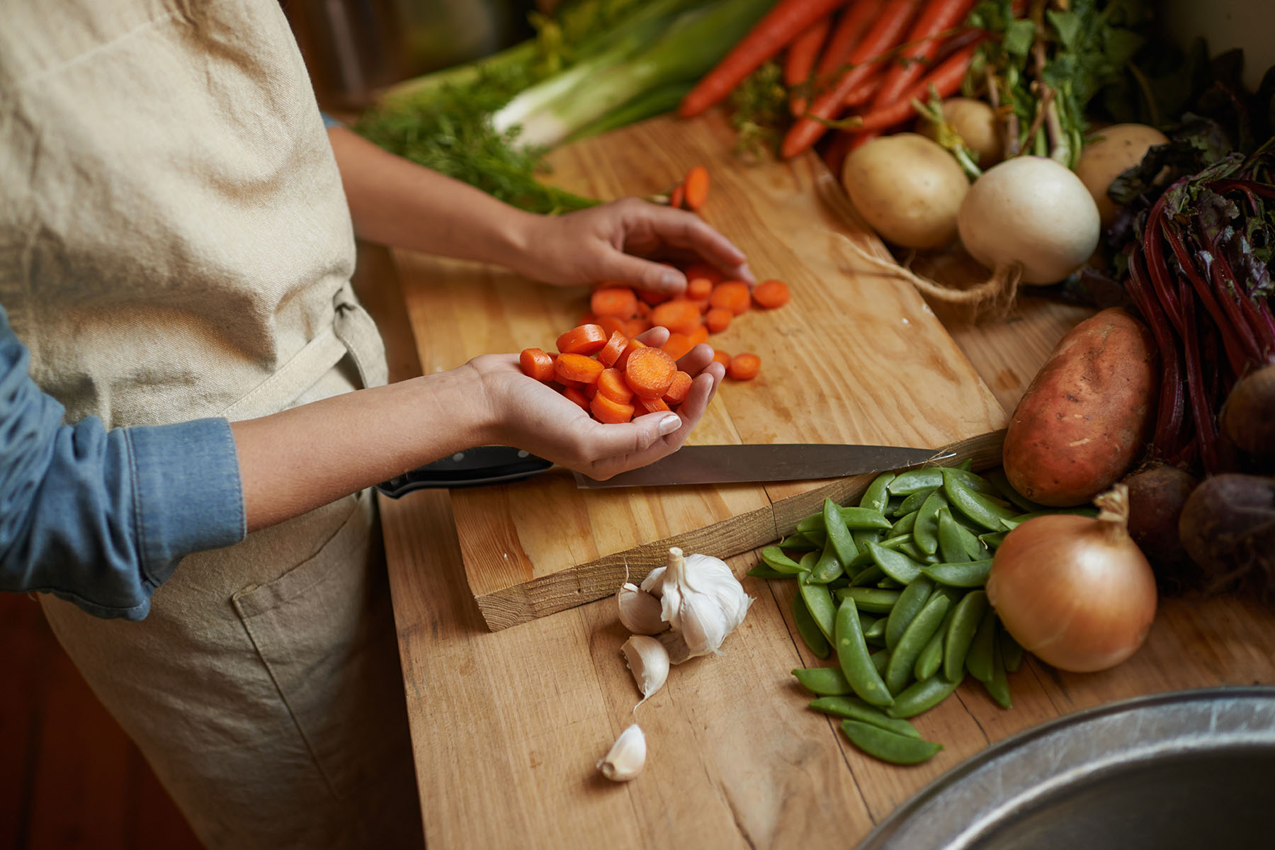 a woman prepping food to cook